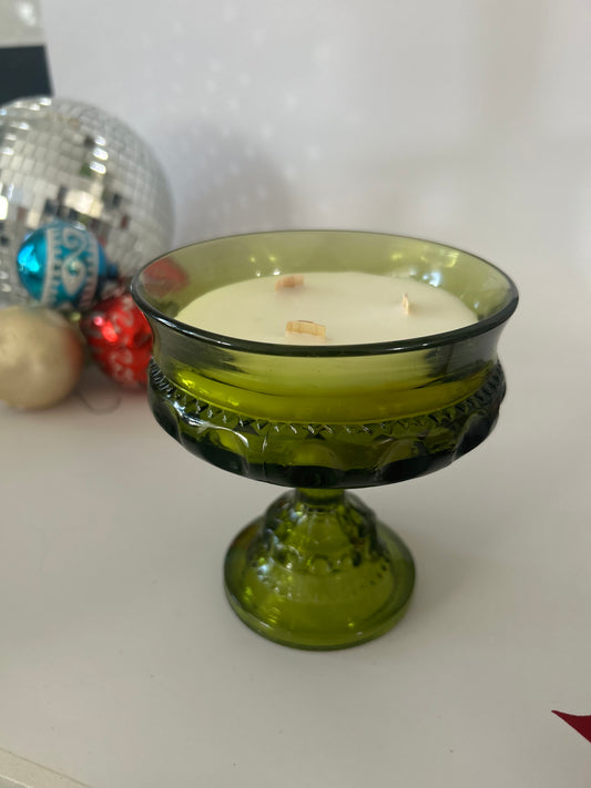 Dark green compote candle