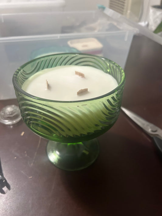 Tall green glass candle
